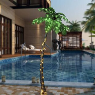 Solar lighted store palm tree